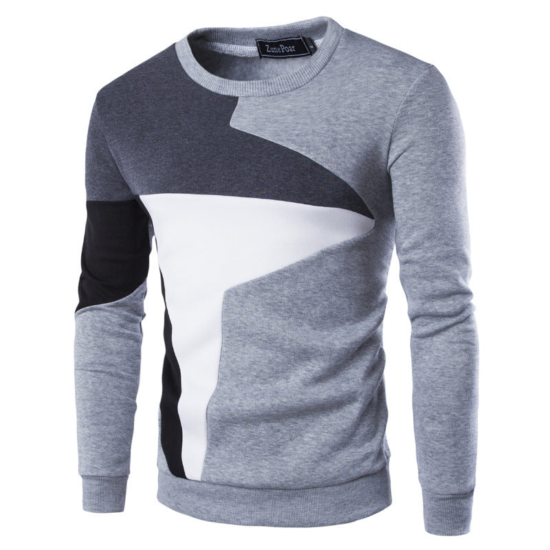 Gray sweater with color-block design on a white background