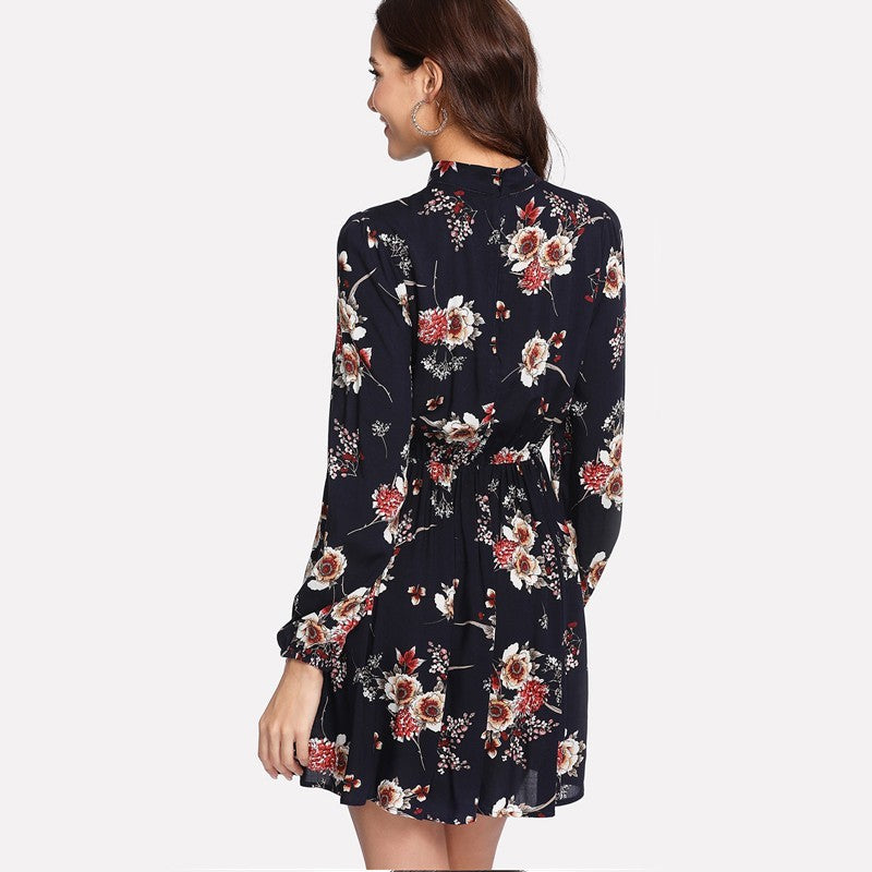 Woman wearing a floral dress on a white background