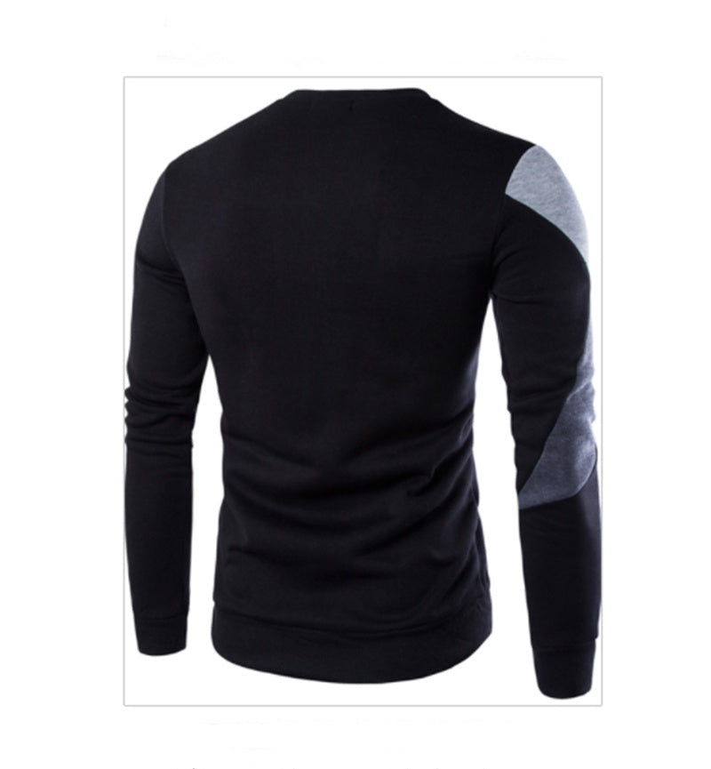 Black long-sleeve shirt with gray sleeve patch on a white background