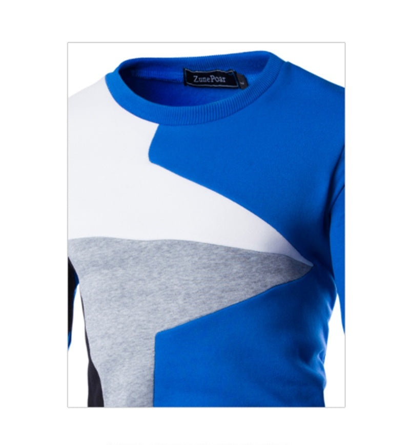 Color-blocked sweater with blue, gray, and white sections on a white background