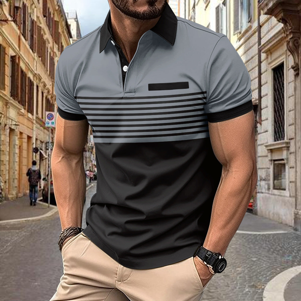 Man wearing a gray and black striped polo shirt on a city street.