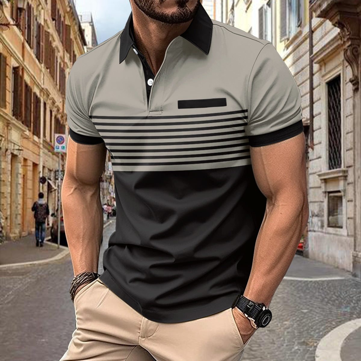 Man wearing a gray and black striped polo shirt on a city street.