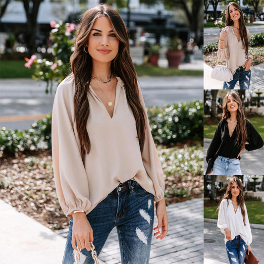 Woman wearing a beige blouse and blue jeans in an outdoor setting