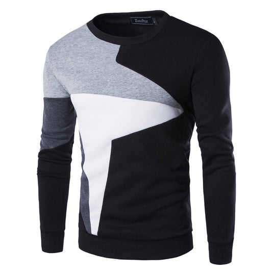Color-blocked sweater with black, gray, and white design on a white background