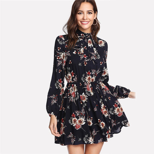 Woman wearing a floral dress on a white background