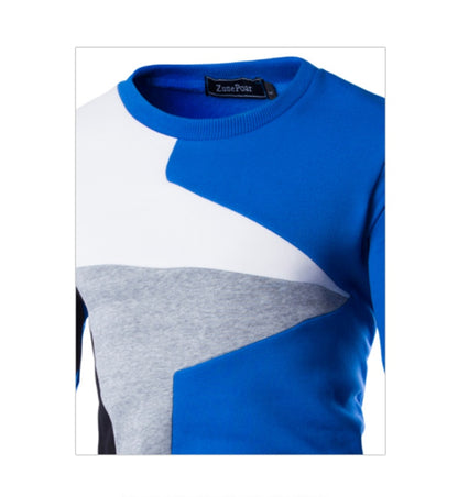 Color-blocked sweater with blue, gray, and white sections on a white background
