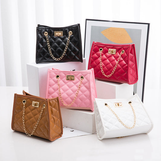Five quilted handbags in black, pink, brown, and white with gold chains on a white background.