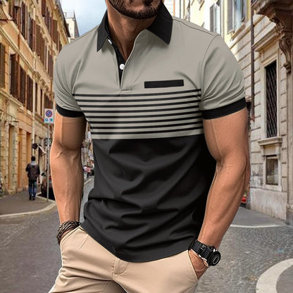 Man wearing a gray and black striped polo shirt on a city street.